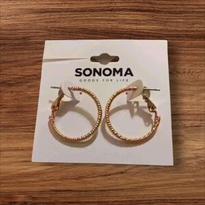 Women's gold hoop earrings